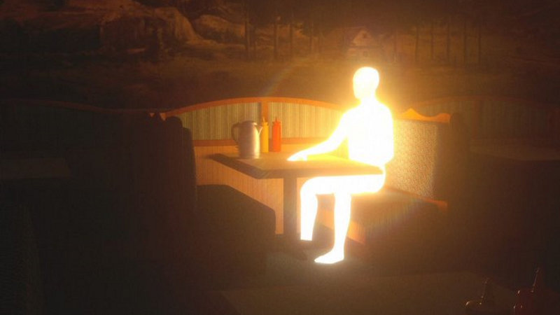 image of a glowing man sitting at a table