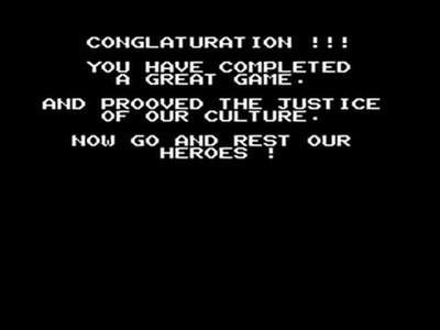 Screenshot of the notoriously poorly-translated ending screen off the Nintendo Entertainment System's "Ghostbusters" game. It reads, in all caps: "Conglaturation!!! You have completed a great game. And prooved the justice of our culture. Now go and rest our heroes!"