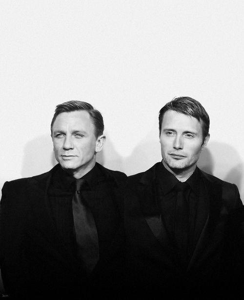 Daniel Craig and Mads Mikkelsen in black and white, looking very handsome